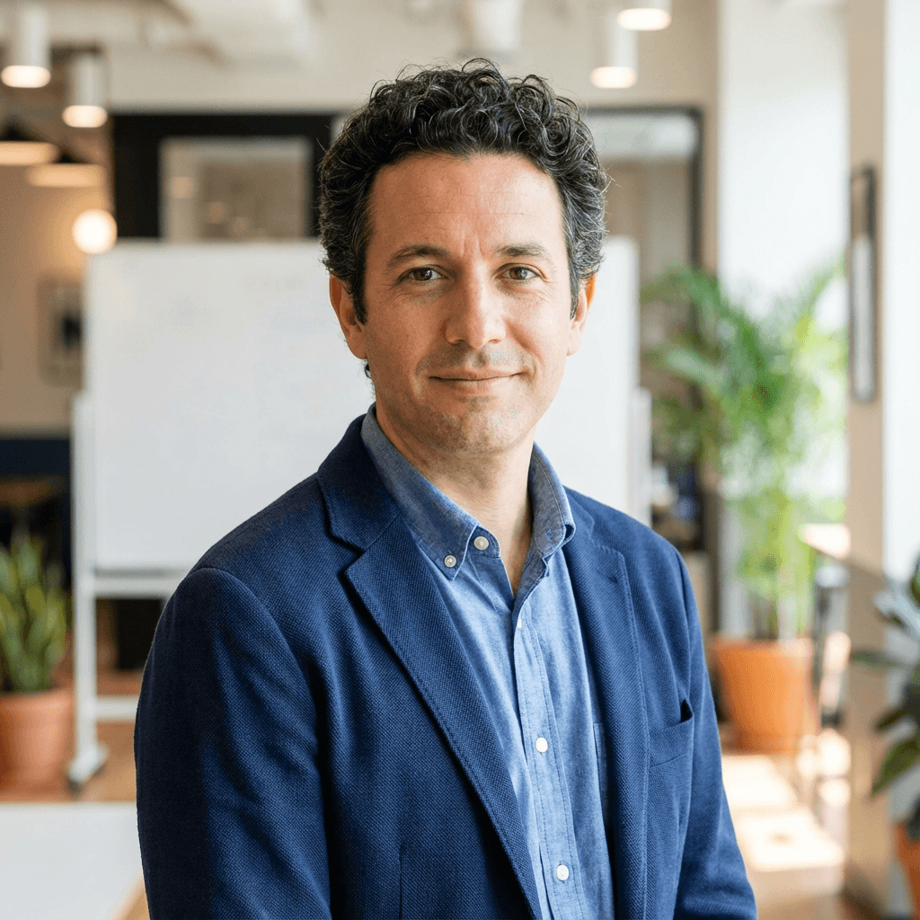 Marc Anthony Cordova Olivares, Founder and Digital Marketing Strategist, in a modern bright office